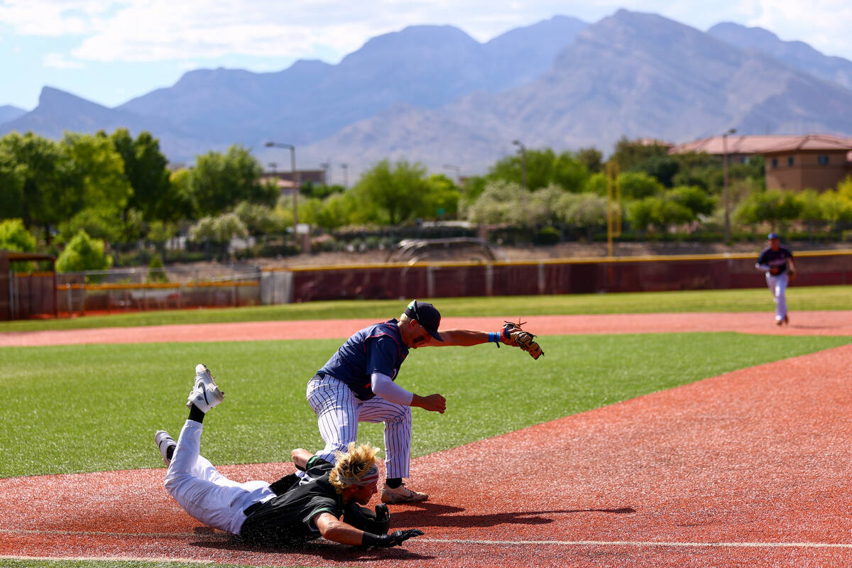 Palo Verde outfielder Jace Jefferies (4) slides into home plate while Coronado first baseman Br ...