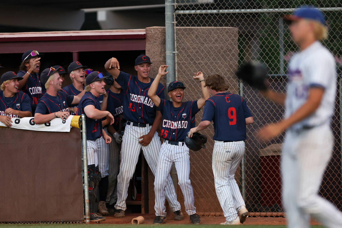 Coronado cheers for their Timmy Ellis (9) after he scored during a Class 5A baseball state tour ...