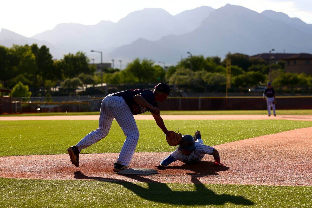 Coronado first baseman Jase Pashales (20) tags out Reno’s Jackson Sellers after he tried ...