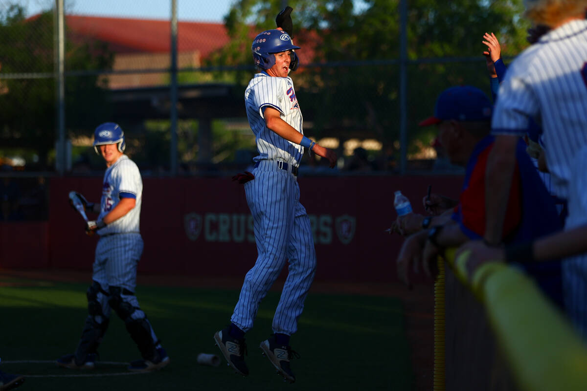 Reno’s Zackary Silverman celebrates after scoring during a Class 5A baseball state tourn ...