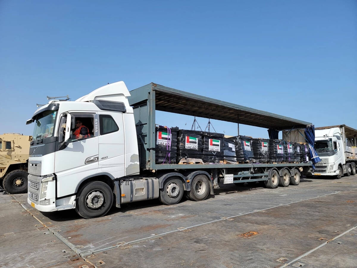 Trucks loaded with humanitarian aid from the United Arab Emirates and the United States Agency ...