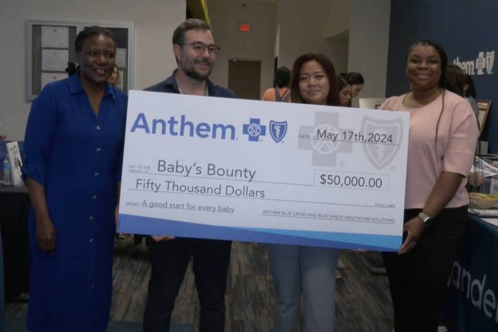 David Kraus, second from left, community outreach manager of Anthem Blue Cross Blue Shield, pre ...
