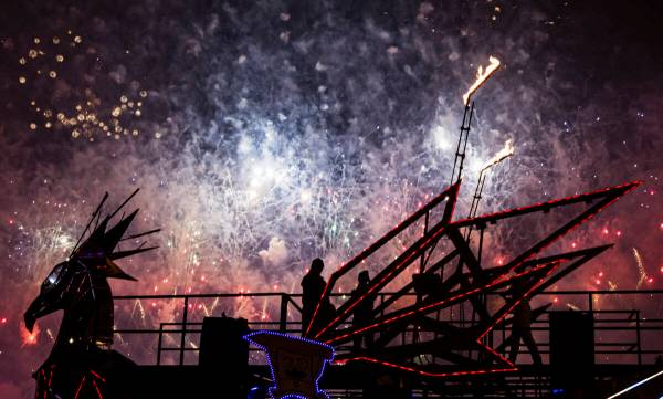 Attendees watch as fireworks go off during the first night of the Electric Daisy Carnival at th ...
