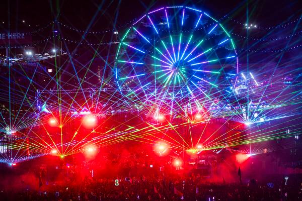 Lasers light up the sky during the first night of the Electric Daisy Carnival at the Las Vegas ...