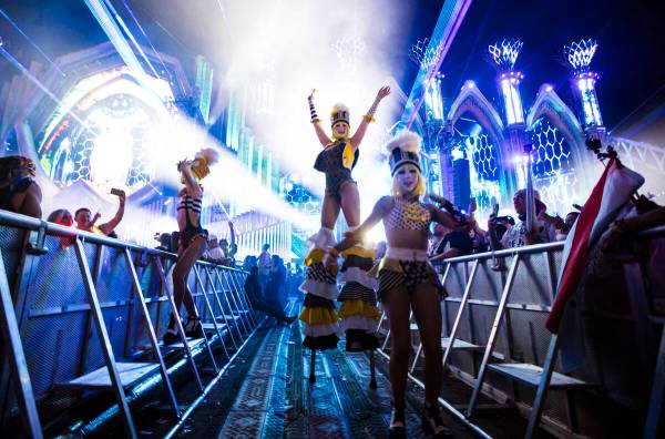Costumed performers entertain the crowd at Kinetic Field during the second night of the Electri ...