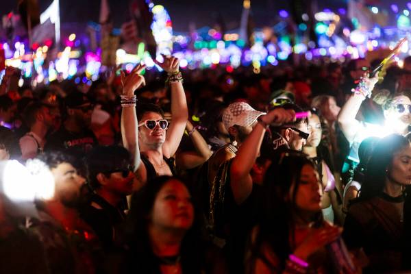 Festival attendees dance at Kinetic Field during the second night of the Electric Daisy Carniva ...