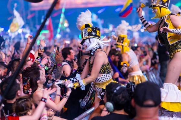 Costumed performers entertain the crowd at Kinetic Field during the second night of the Electri ...