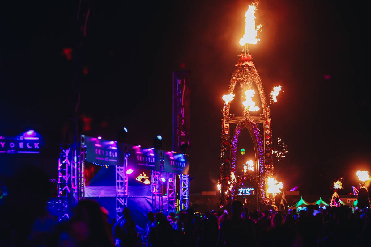 Fire erupts from an art installation on the third and final night of the Electric Daisy Carniva ...