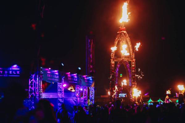 Fire erupts from an art installation on the third and final night of the Electric Daisy Carniva ...