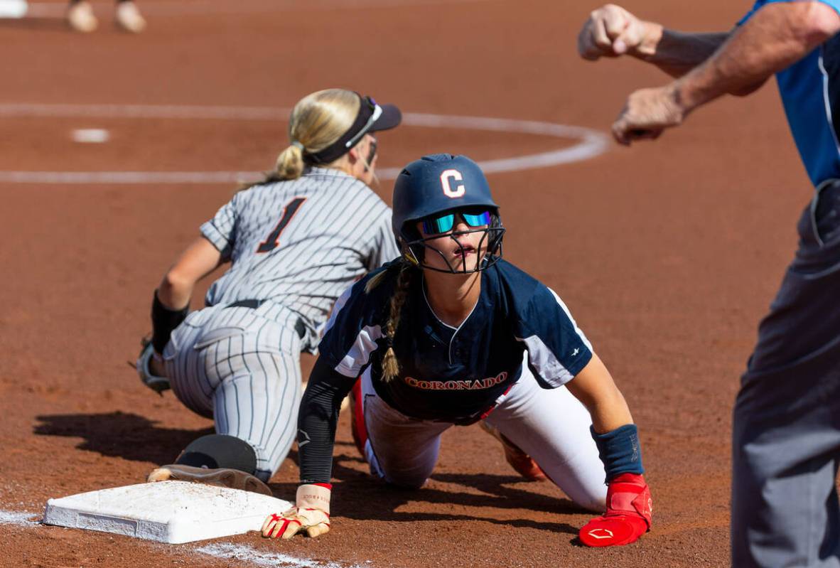 Coronado runner Bailey Goldberg (1) looks to see she is called out after a diving attempt back ...