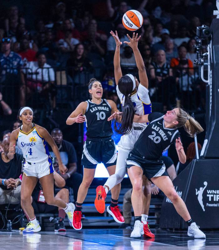 Los Angeles Sparks forward Rickea Jackson (2) takes a shot from Aces guard Kate Martin (20) und ...