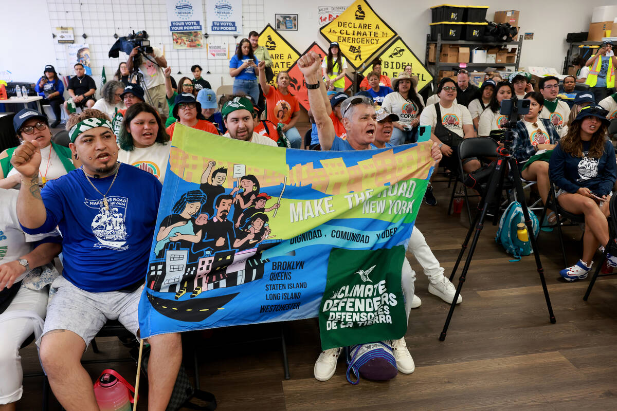 Carlos Najera, left, and Luis Gil, both with Make the Road New York, and activists from Make th ...