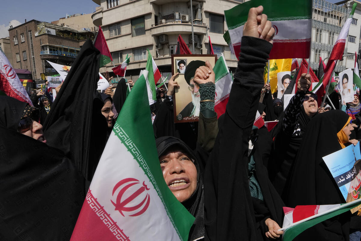 FILE - Iranian worshippers chant slogans during an anti-Israeli gathering after Friday prayers ...