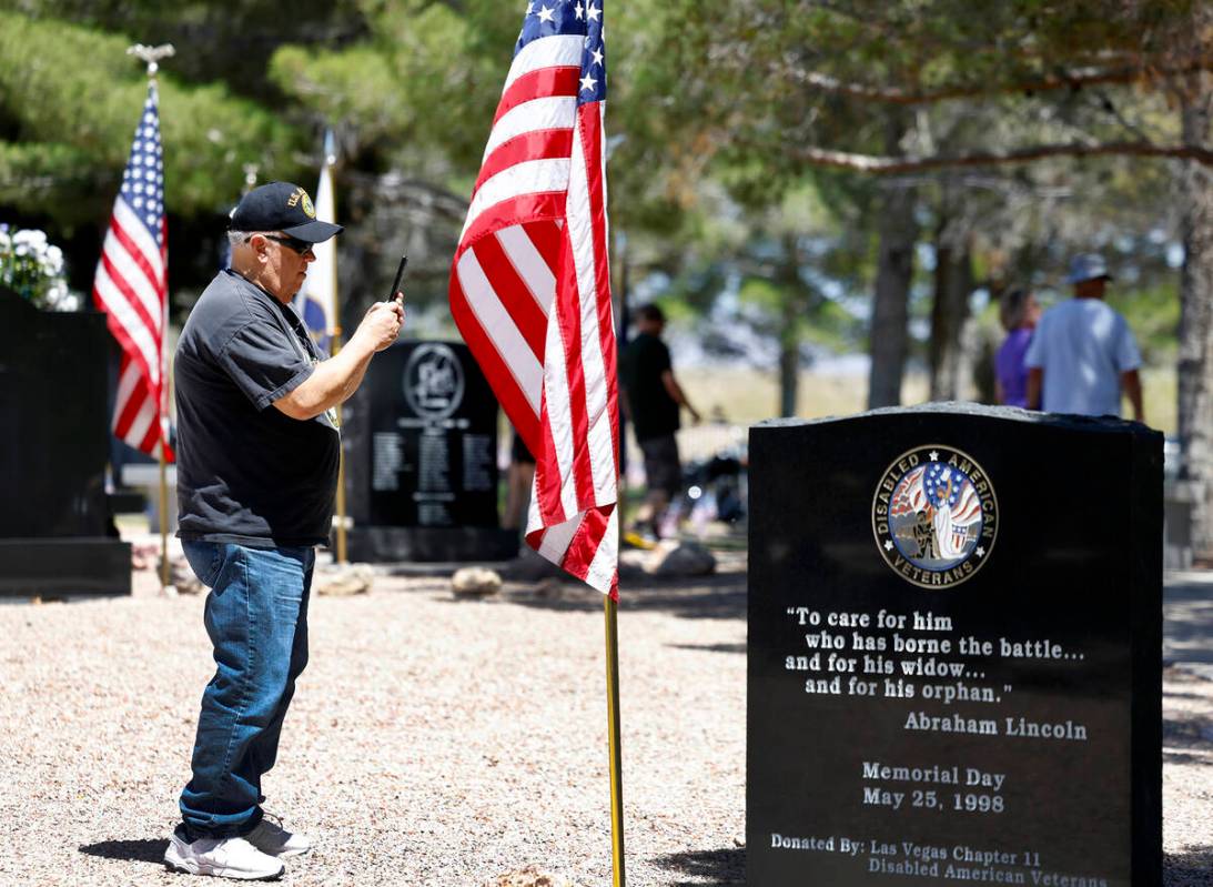 Retired U.S. Army veteran Larry King visits the Southern Nevada Veterans Memorial Cemetery on M ...