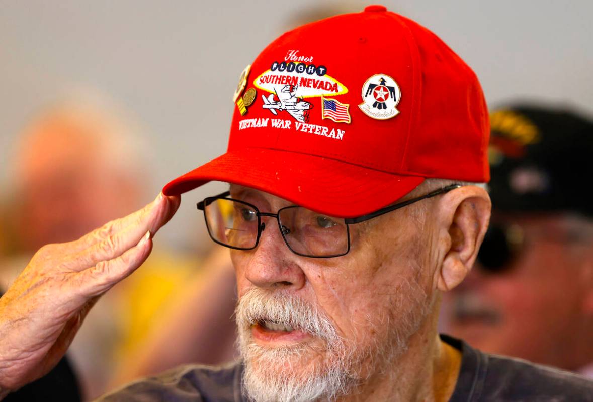 Retired Air Force veteran Larry King, who fought the war in Vietnam, salutes during the Nationa ...