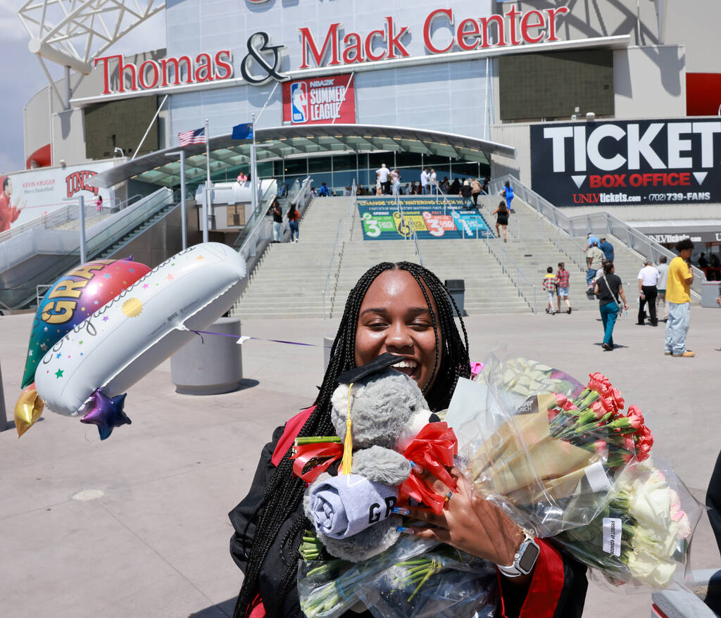 Adult Education graduate Jada Jackson smiles after her graduation ceremony at Thomas & Mack ...