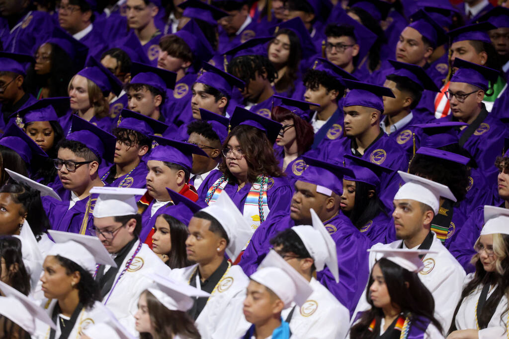 Durango High School students listen to a speaker during graduation at Thomas & Mack Center ...