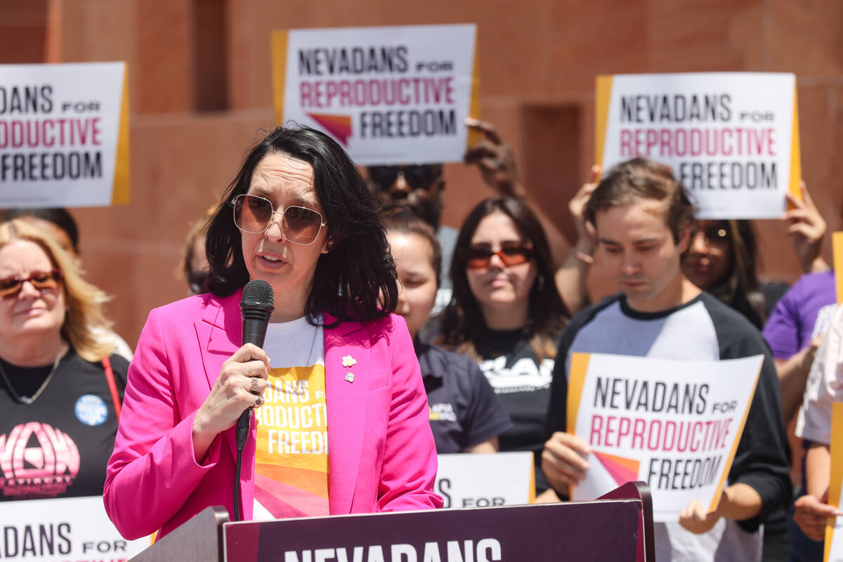 Lindsey Harmon, president of Nevadans for Reproductive Freedom, addresses the media during a pr ...