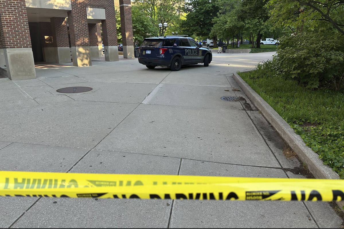 University of Michigan campus police block an area Tuesday, May 21, 2024, in Ann Arbor, Mich., ...