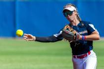 Coronado infielder Bailey Goldberg (1) throws to first base against a Douglas runner during the ...