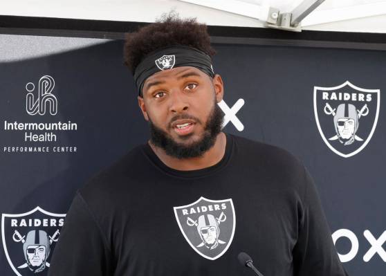 Raiders offensive tackle Thayer Munford Jr. addresses the media after participating in organize ...