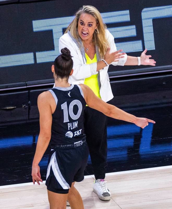 Aces head coach Becky Hammond yells at guard Kelsey Plum (10) as the game gets away against the ...