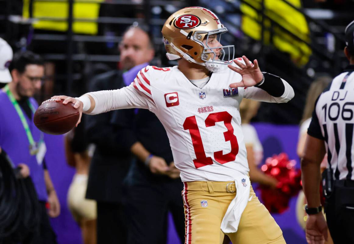 San Francisco 49ers quarterback Brock Purdy (13) looks to pass the ball during the first half o ...