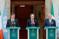 The three Irish Government leaders from left, Minister Eamon Ryan, Taoiseach Simon Harris and T ...