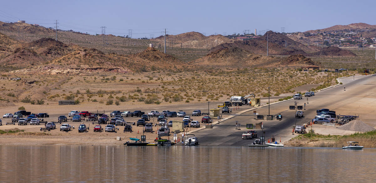 Boaters move about the Hemenway boat launch during a safe boating media event at the Lake Mead ...