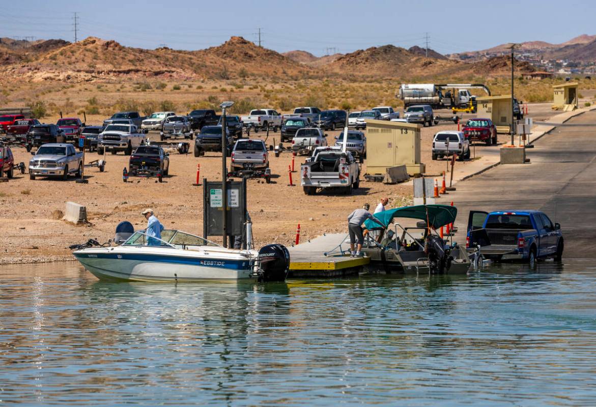 Boaters move about the Hemenway boat launch during a safe boating media event at the Lake Mead ...