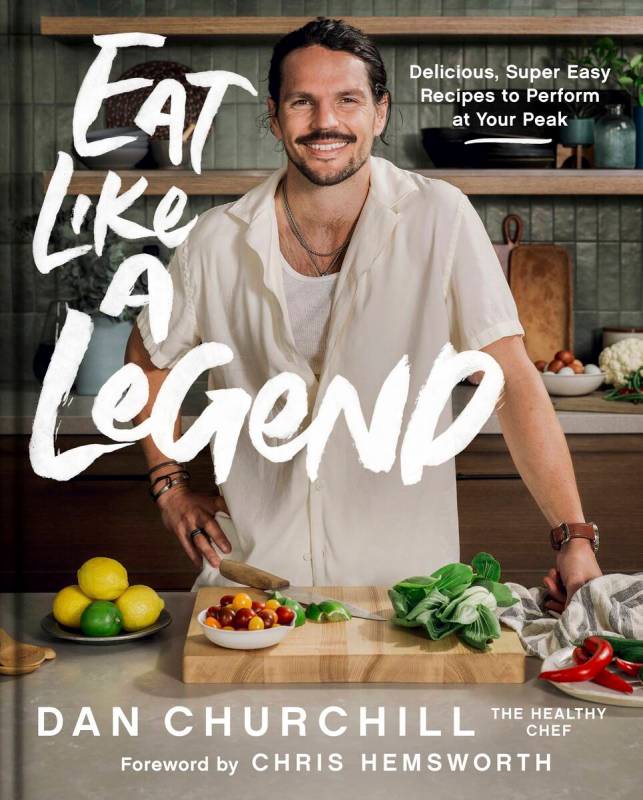 This cover image released by HarperOne shows "Eat Like a Legend" by Dan Churchill, a ...