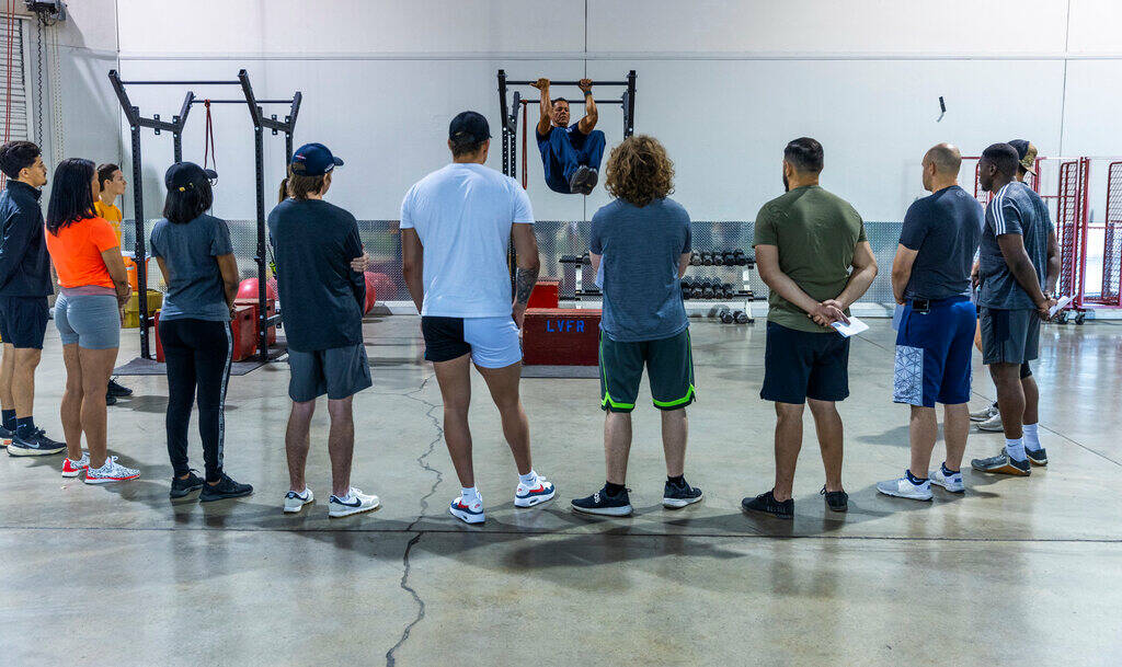 Participants receive a skill demonstration during the Las Vegas Fire & Rescue free communit ...