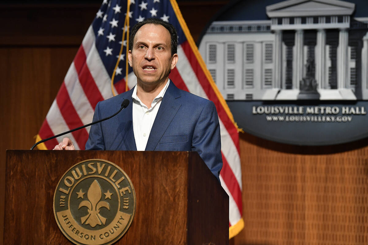 Louisville Mayor Craig Greenberg speaks to reporter during a press conference Thursday, May 23, ...