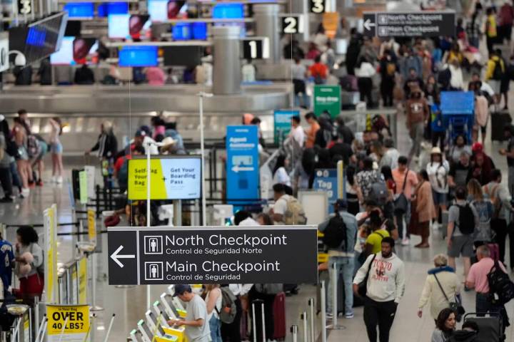 Travelers move through Hartsfield-Jackson Atlanta International Airport ahead of Memorial Day, ...