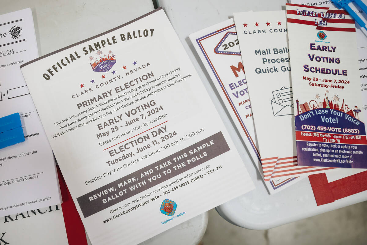 A sample ballot and voting pamphlets are seen at the Clark County Election Department on Thursd ...