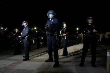 Police prepare to enter an encampment occupied by pro-Palestinian demonstrators on the UCLA cam ...
