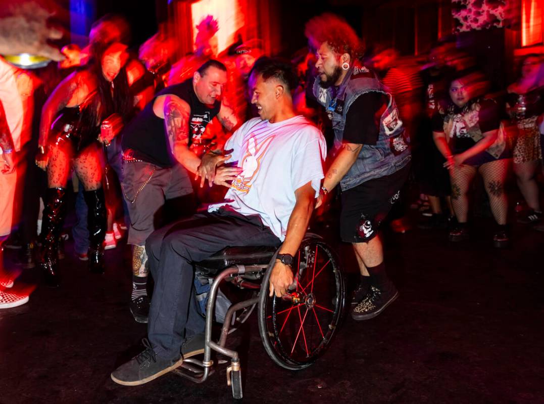 Festival attendees mosh as The Meteors perform during a Punk Rock Bowling music festival club s ...