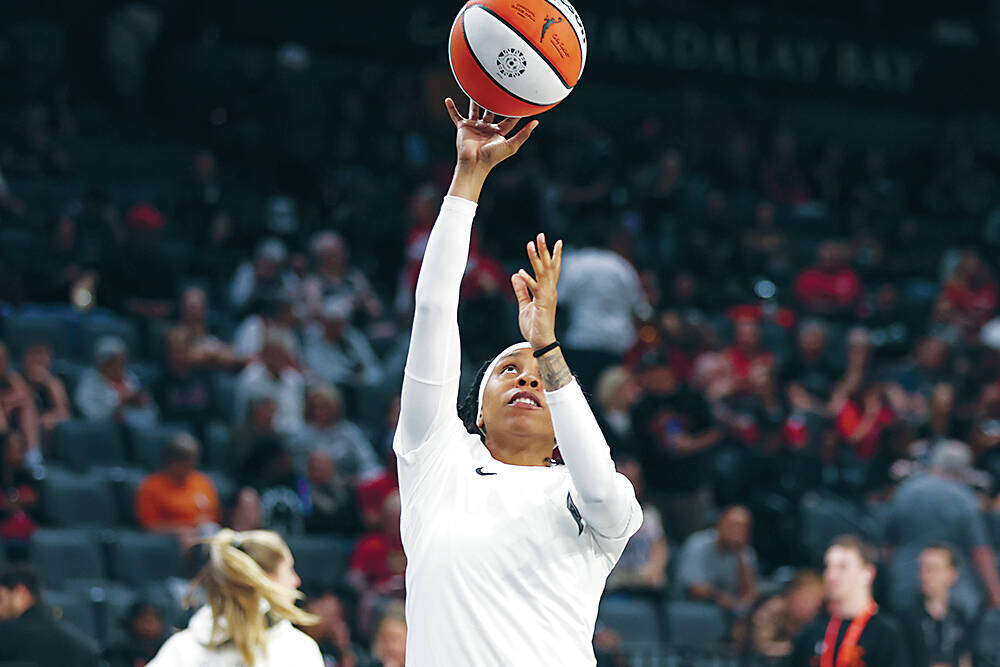 Las Vegas Aces guard Dyaisha Fair warms up before the second half of a WNBA basketball game aga ...
