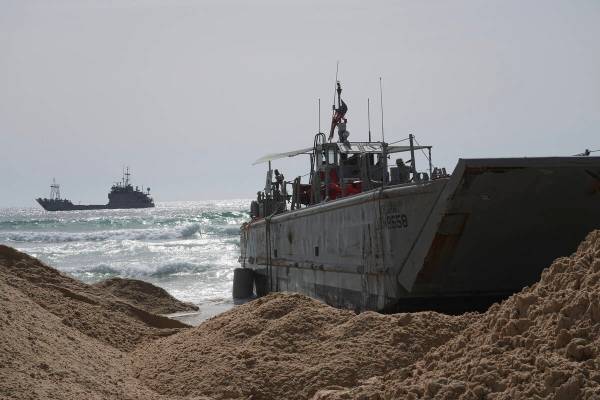 A U.S. Army landing craft is seen beached in Ashdod on Sunday, May 26, 2024, after being swept ...
