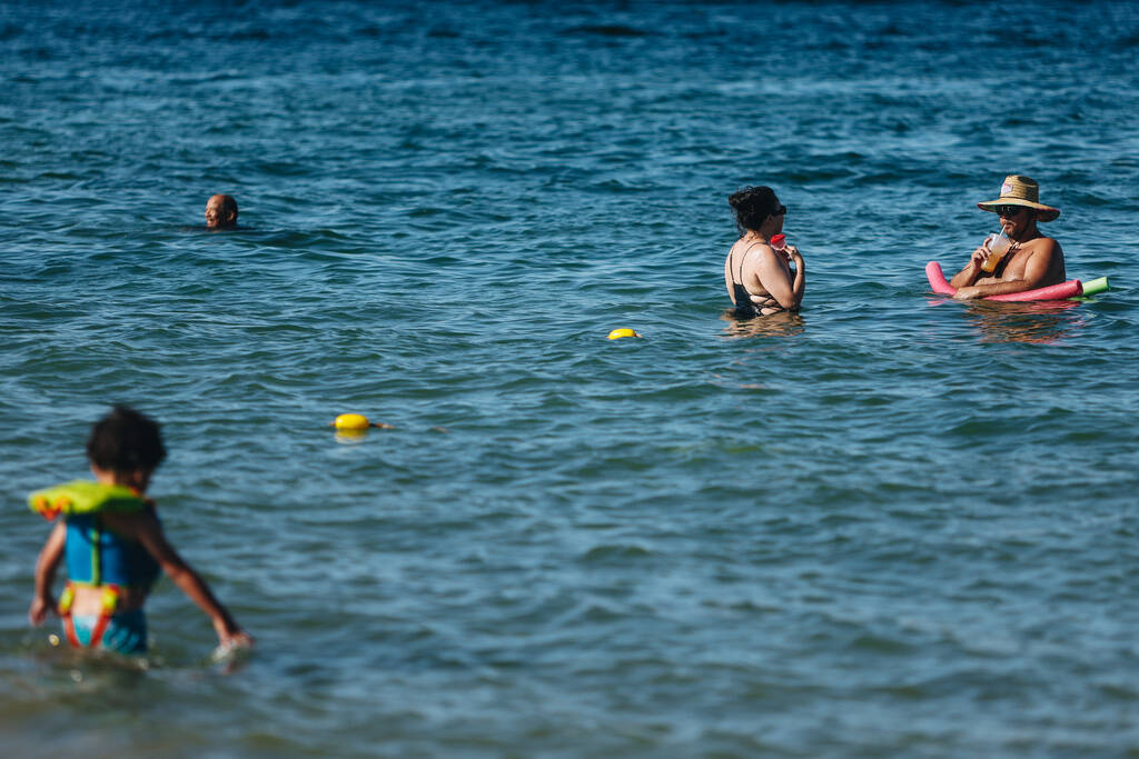 People enjoy the water during Memorial Day weekend at Lake Mead National Recreation Area on Sun ...