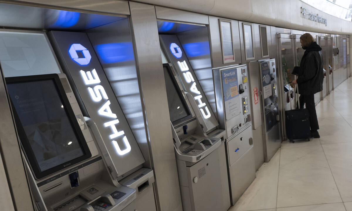 FILE - Chase Bank ATMs are shown, Thursday, March 25, 2021, in New York. As many Americans cele ...