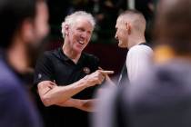 Basketball Hall of Fame legend Bill Walton, left, jokes with Denver Nuggets center Nikola Jokic ...