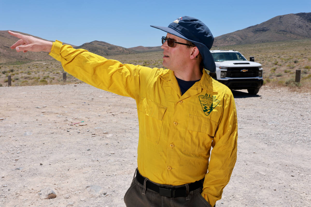 Shane Kelly, BLM Southern Nevada District fire prevention specialist, talks to the news media i ...