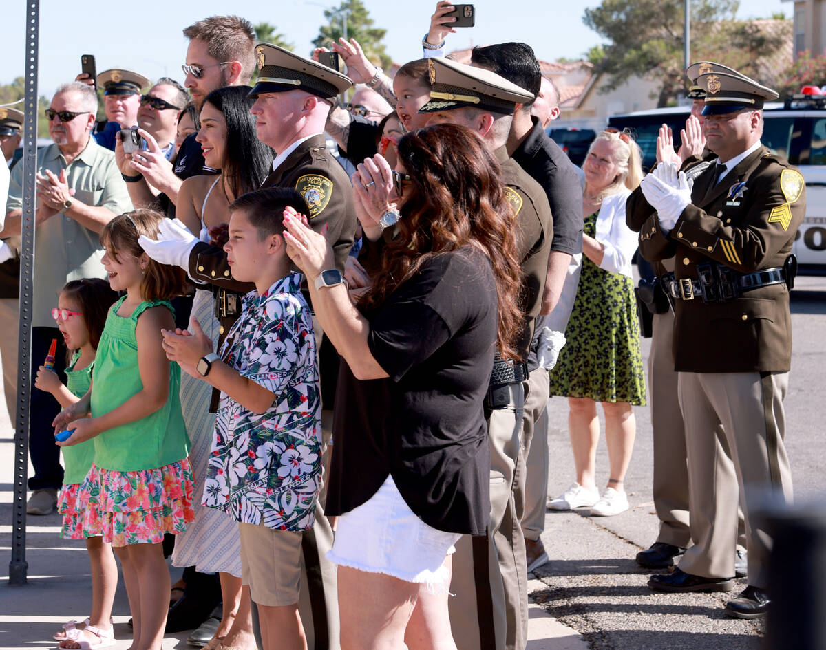 Family of fallen Las Vegas police Sgt. Henry Prendes react to the unveiling the new Henry Prend ...