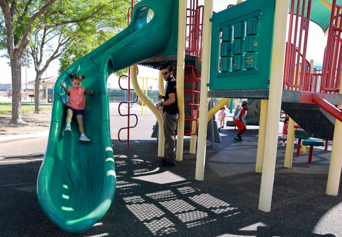 Selena, 2, granddaughter of fallen Las Vegas police Sgt. Henry Prendes, plays in the newly rena ...