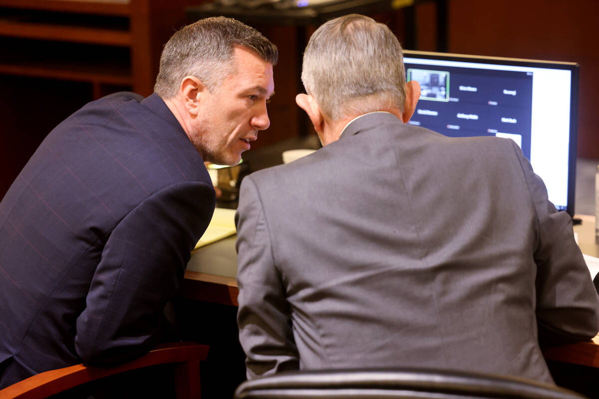 State of Nevada attorneys Michael Gayan left, and Don Springmeyer confer during a Clark County ...