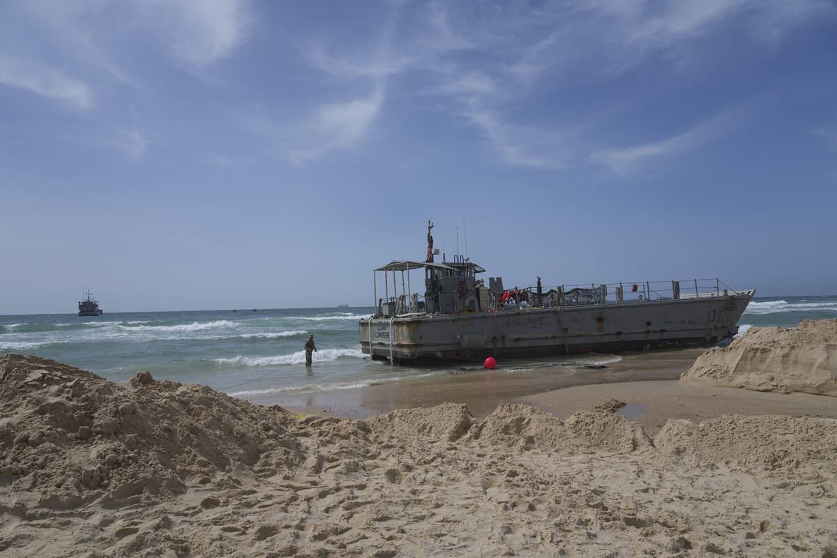 A U.S. Army landing craft is seen beached in Ashdod on Sunday, May 26, 2024, after being swept ...