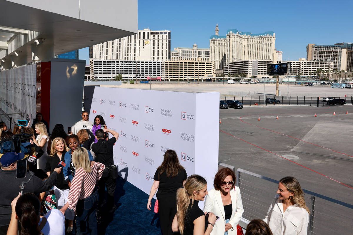 Queen Latifah, rear left, and Sherri Shepherd walk the red carpet during the QVC The Age of Pos ...