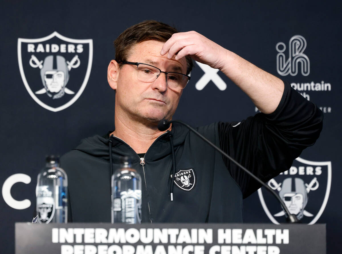 Raiders quarterbacks coach Rich Scangarello pauses as he addresses the media before team's prac ...