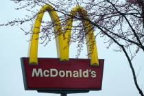 A McDonald's sign is seen, March 14, 2024, in Wheeling, Ill. McDonald’s is fighting back agai ...